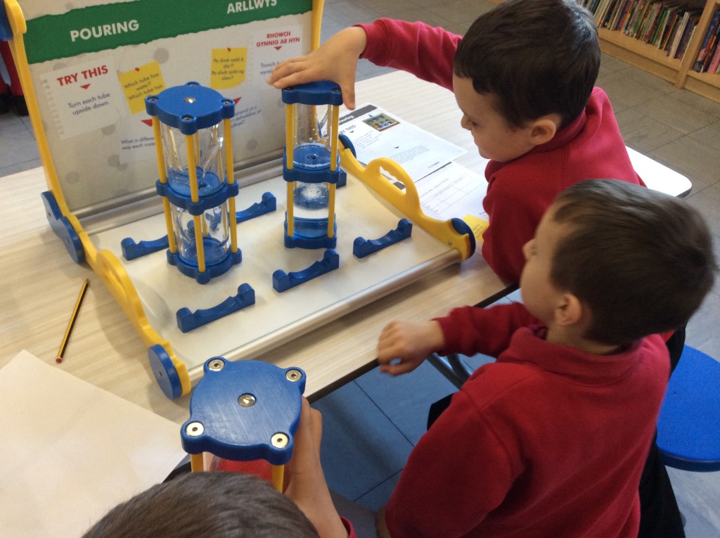 school children doing science experiment