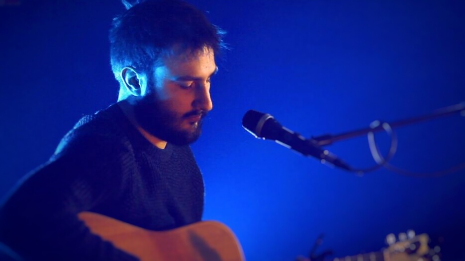 Araby playing guitar