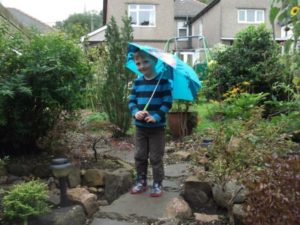 Boy with umbrella
