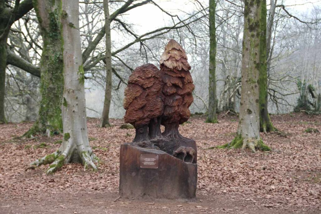 Wooden sculpture of a forest with animals