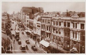 Tramcar on city street in the 1930s