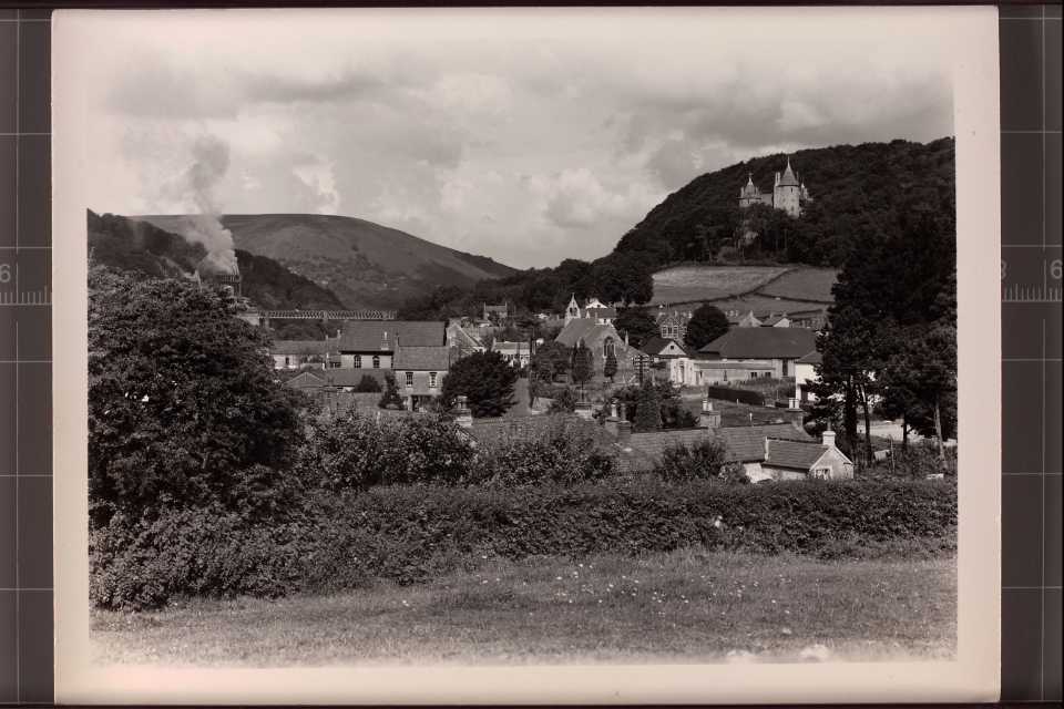 A view, looking north up the Taff Gorge, showing the Garth, Walnut Tree Viaduct and Castell Coch with Tongwynlais in the foreground. The photo was registered in 1954.
